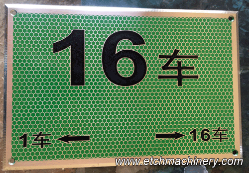 Etched metal sign